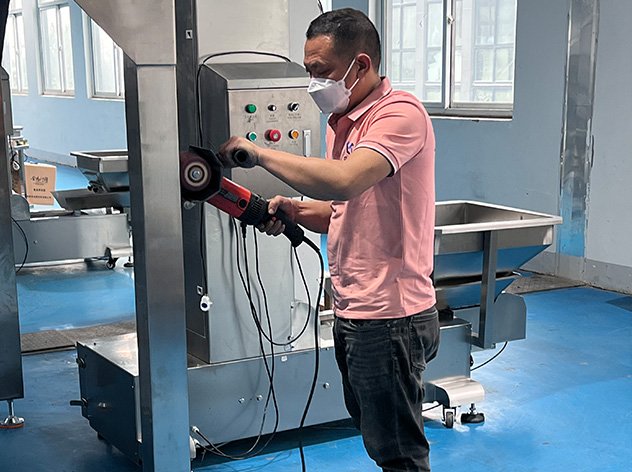 Lantu worker finishing a machine surface